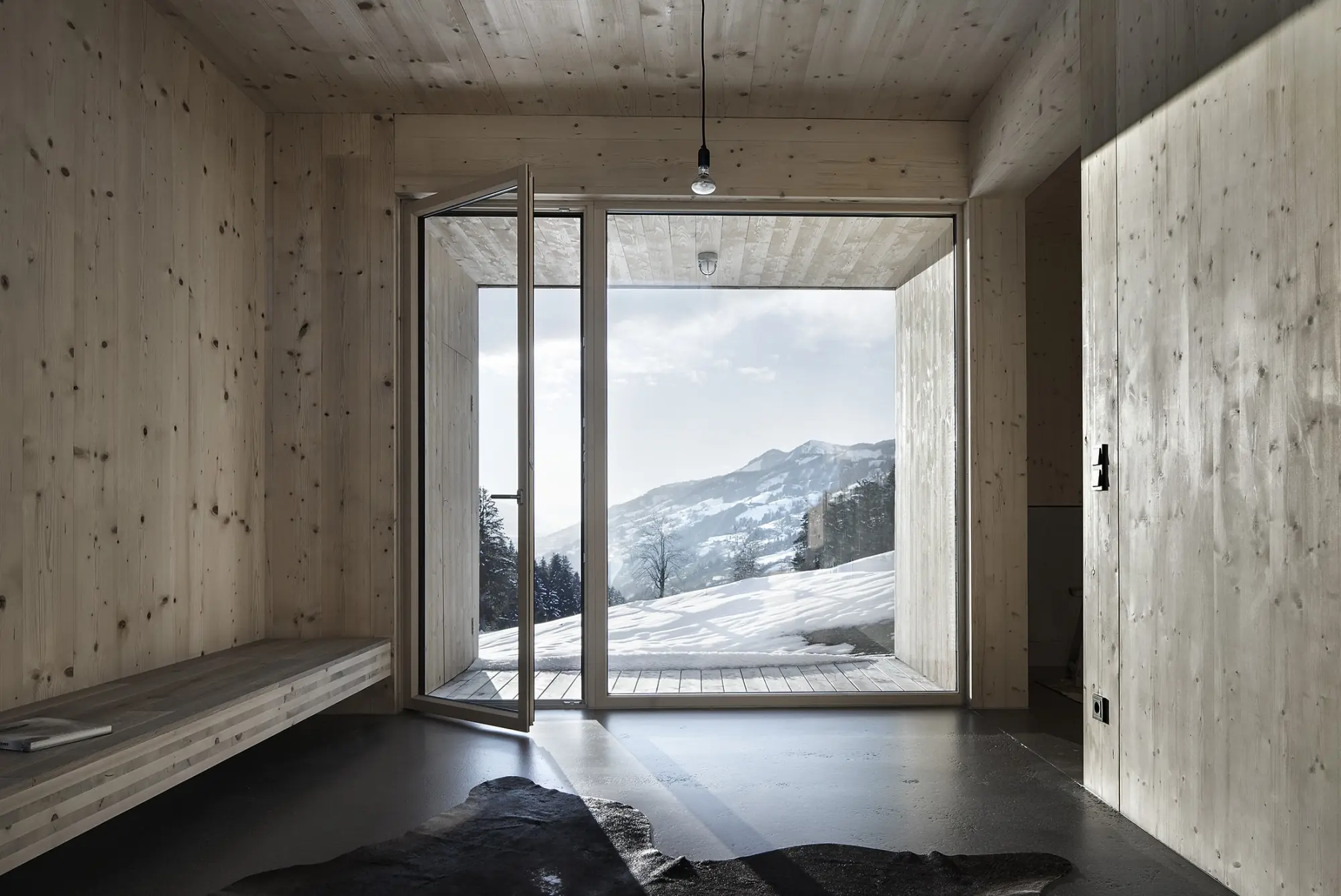 Open space with CLT walls and ceilings