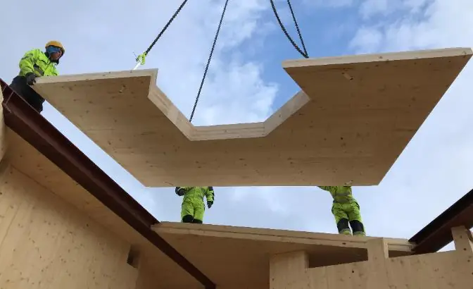 A timber element lifted on site